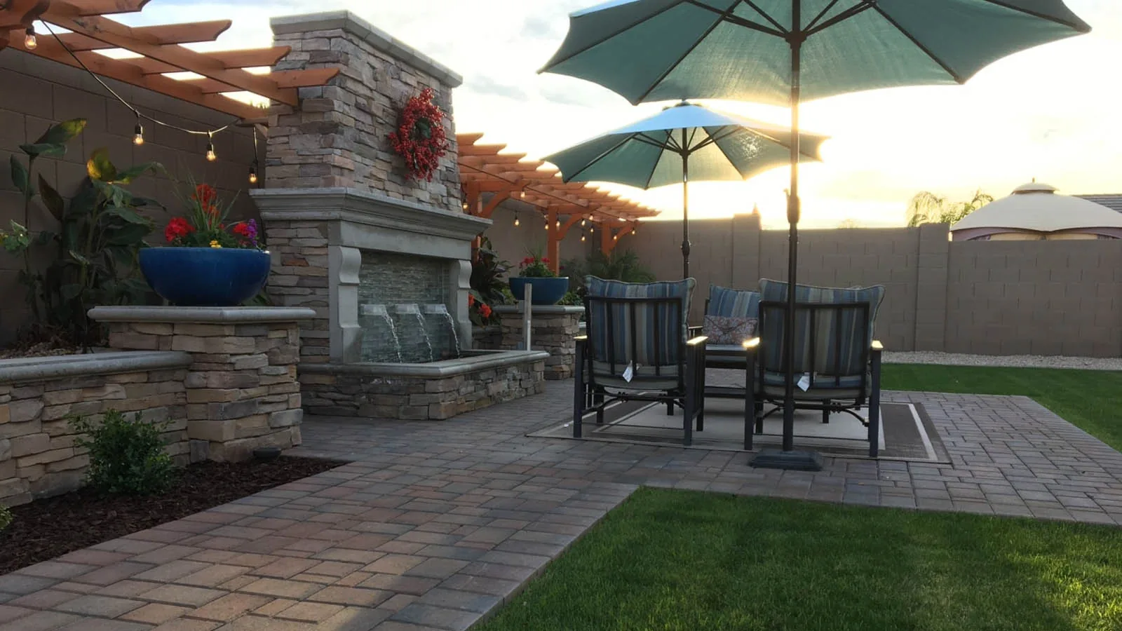 Phoenix-area backyard patio with pavers and landscaping