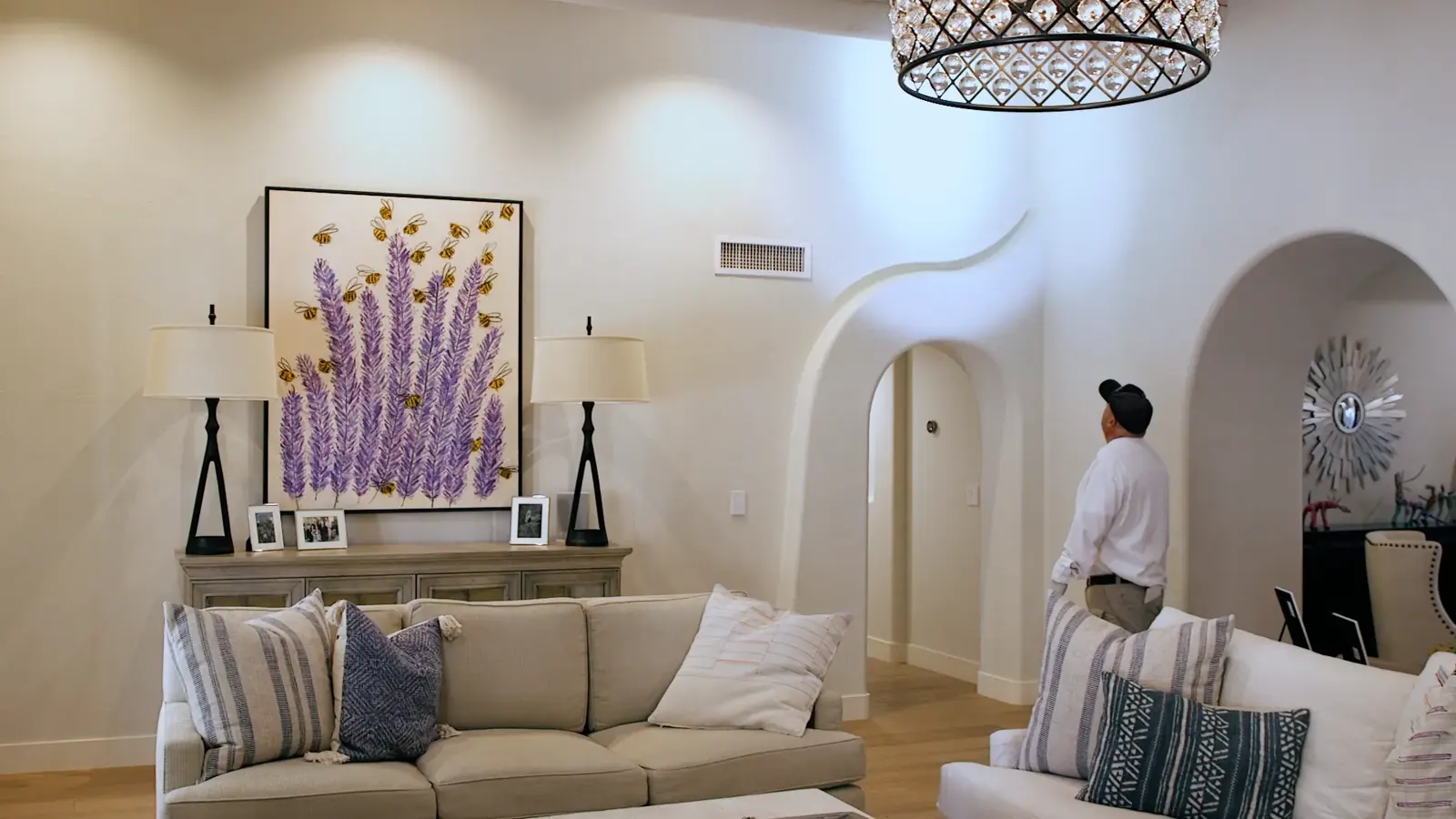 Technician inspecting a living room