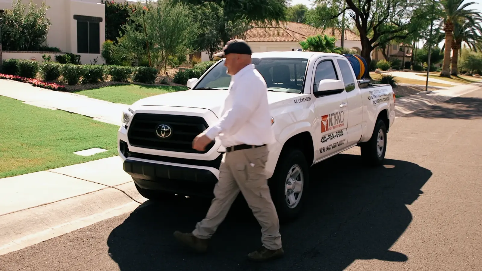 Technician walking from a KY-KO truck