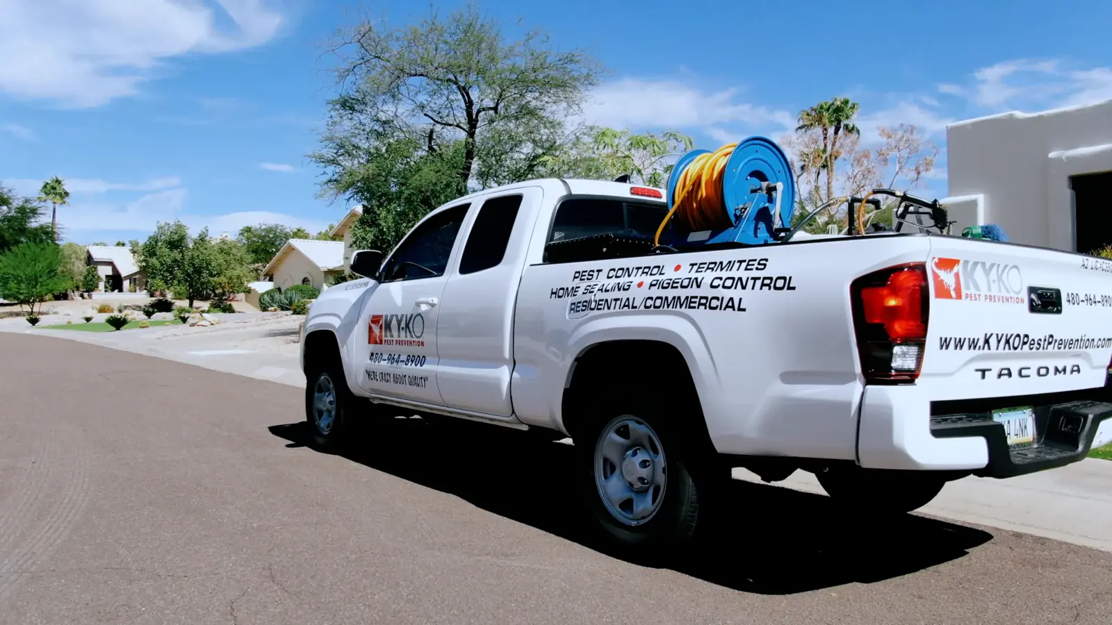 KY-KO Pest Prevention truck parked at the curb