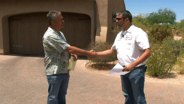 A KY-KO tech shakes the hand of this local homeowner after explaining the findings of their free pest inspection.